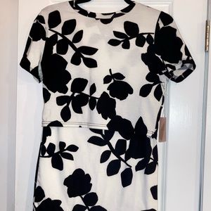 Two piece floral outfit. Cropped shirt and knee length fitted skirt, size large.